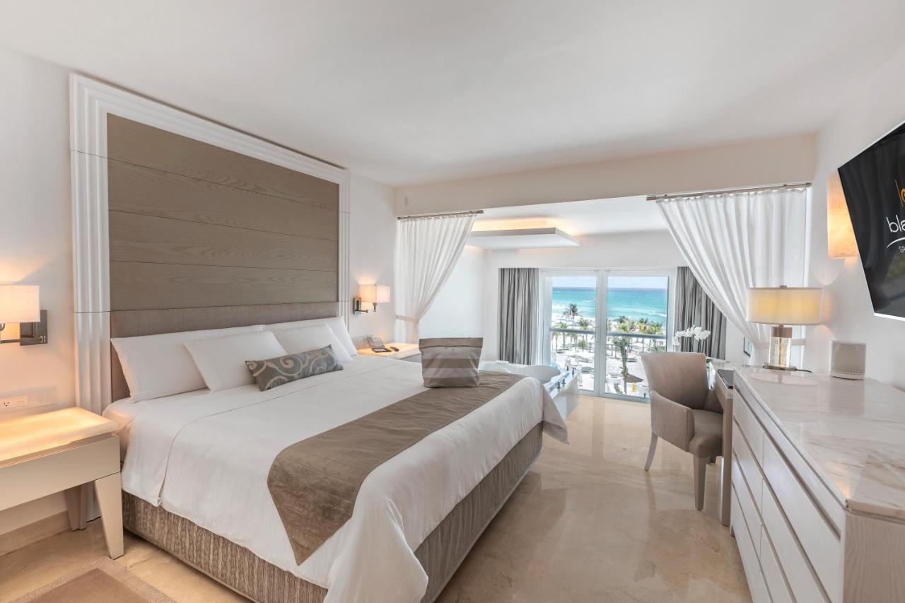 Royale Flitterwochensuite zum Meer – Kingsize-Bett