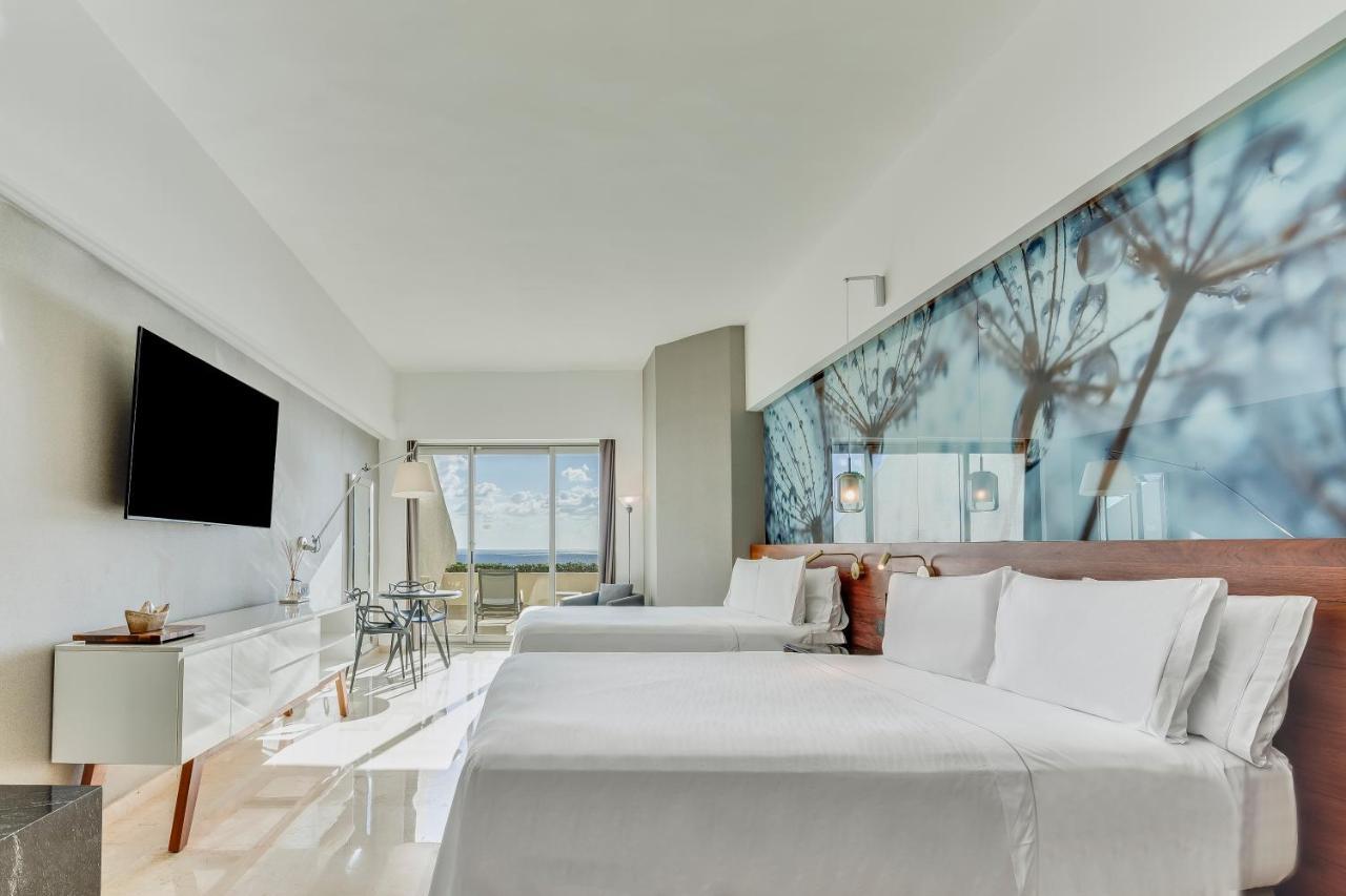 Premium Zimmer mit 2 Doppelbetten und Terrasse - Meerseite