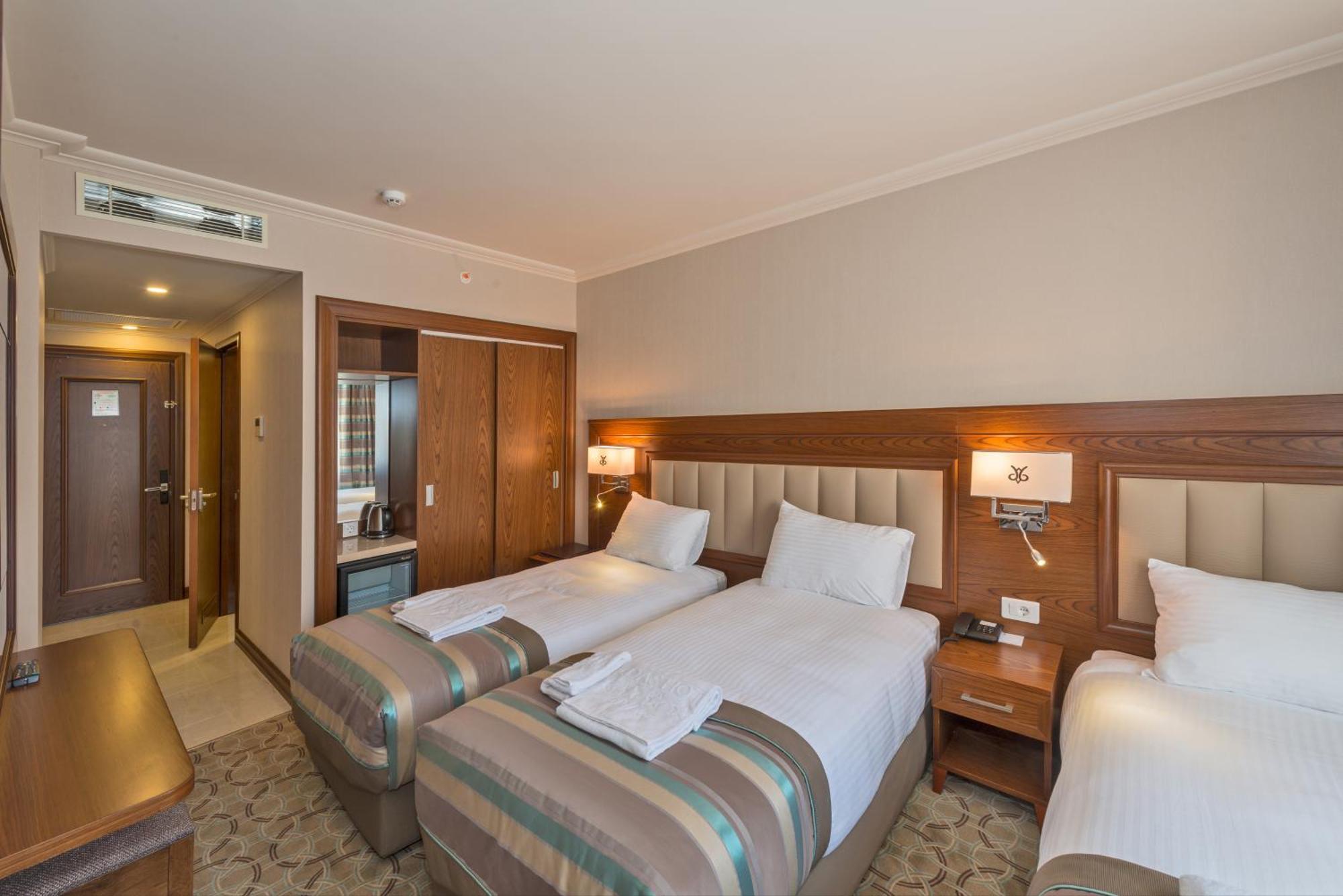 Deluxe Dreibettzimmer