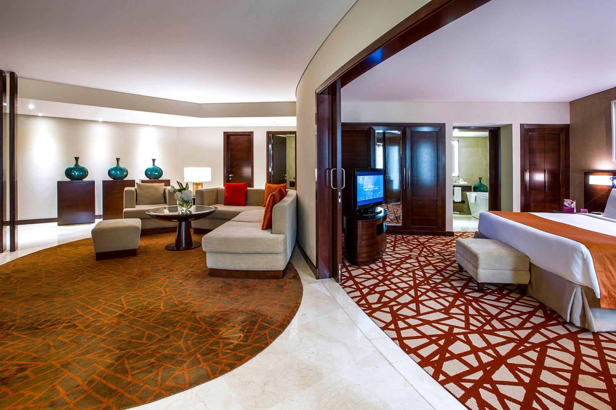 Suite mit 1 Schlafzimmer und Kingsize-Bett sowie Zugang zur Lounge