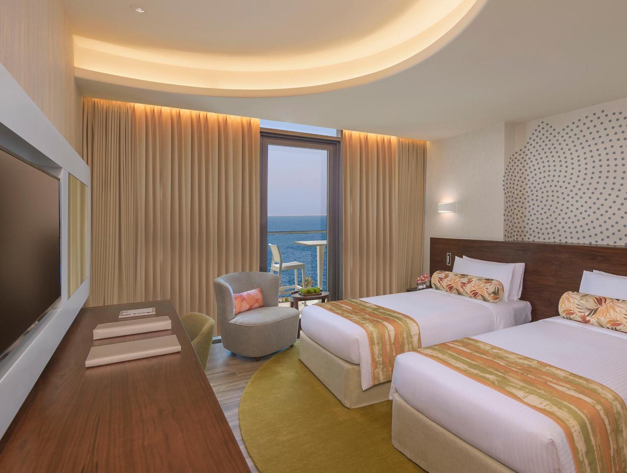 Deluxe Zimmer mit Balkon und eingeschränktem Meerblick