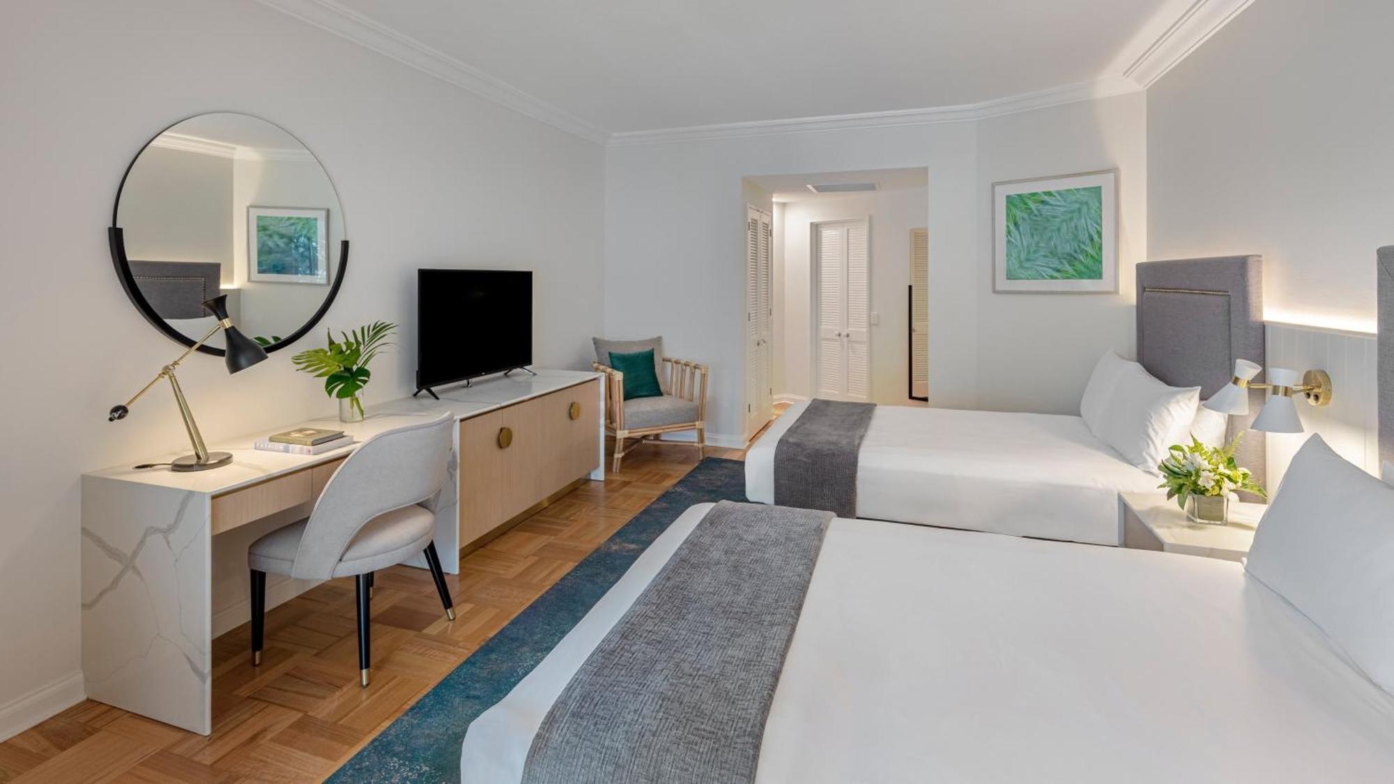 Classic Doppelzimmer mit 2 Doppelbetten und Lagunenblick