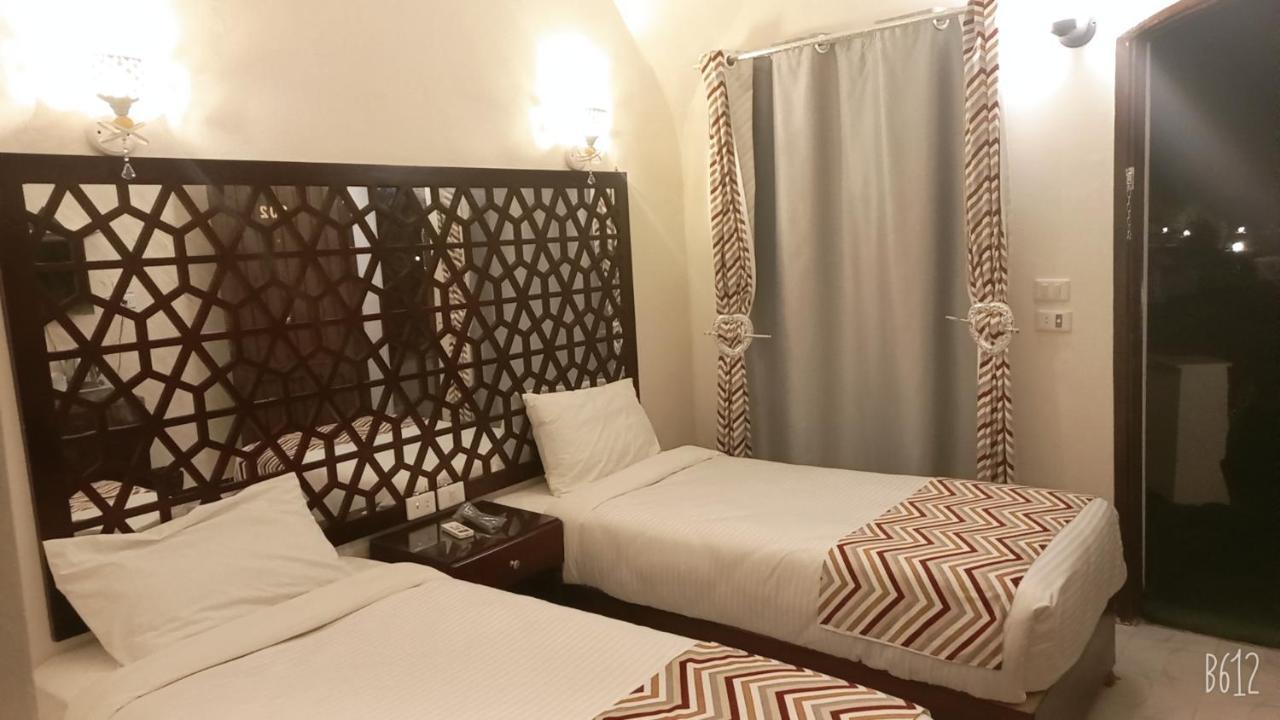 Zweibettzimmer mit Meerblick