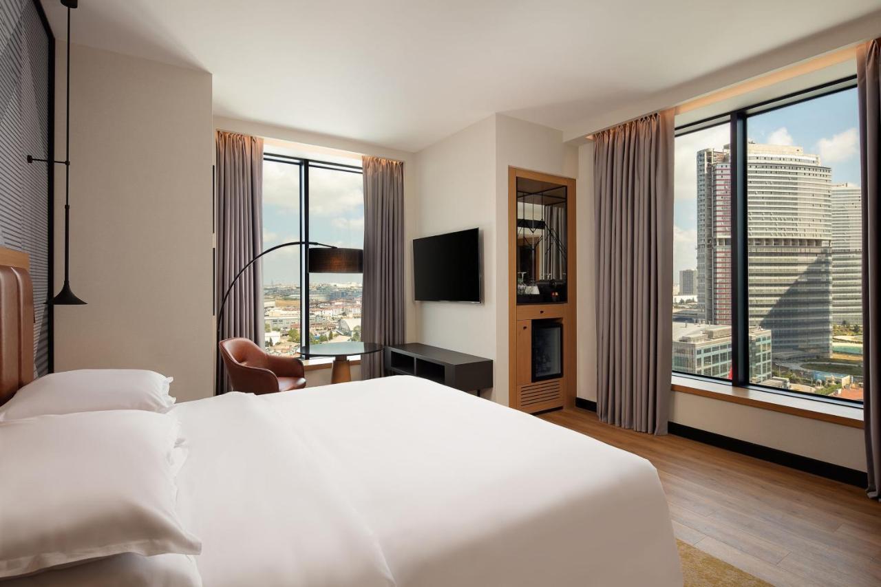 Executive Eckzimmer mit Kingsize-Bett - Zugang zur Club Lounge