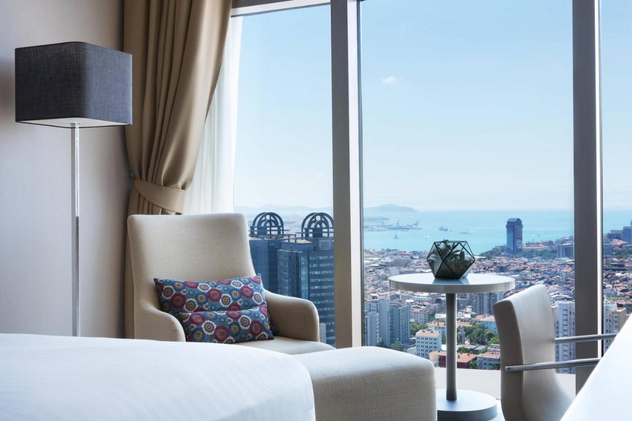 Deluxe Zimmer mit Kingsize-Bett mit Meerblick