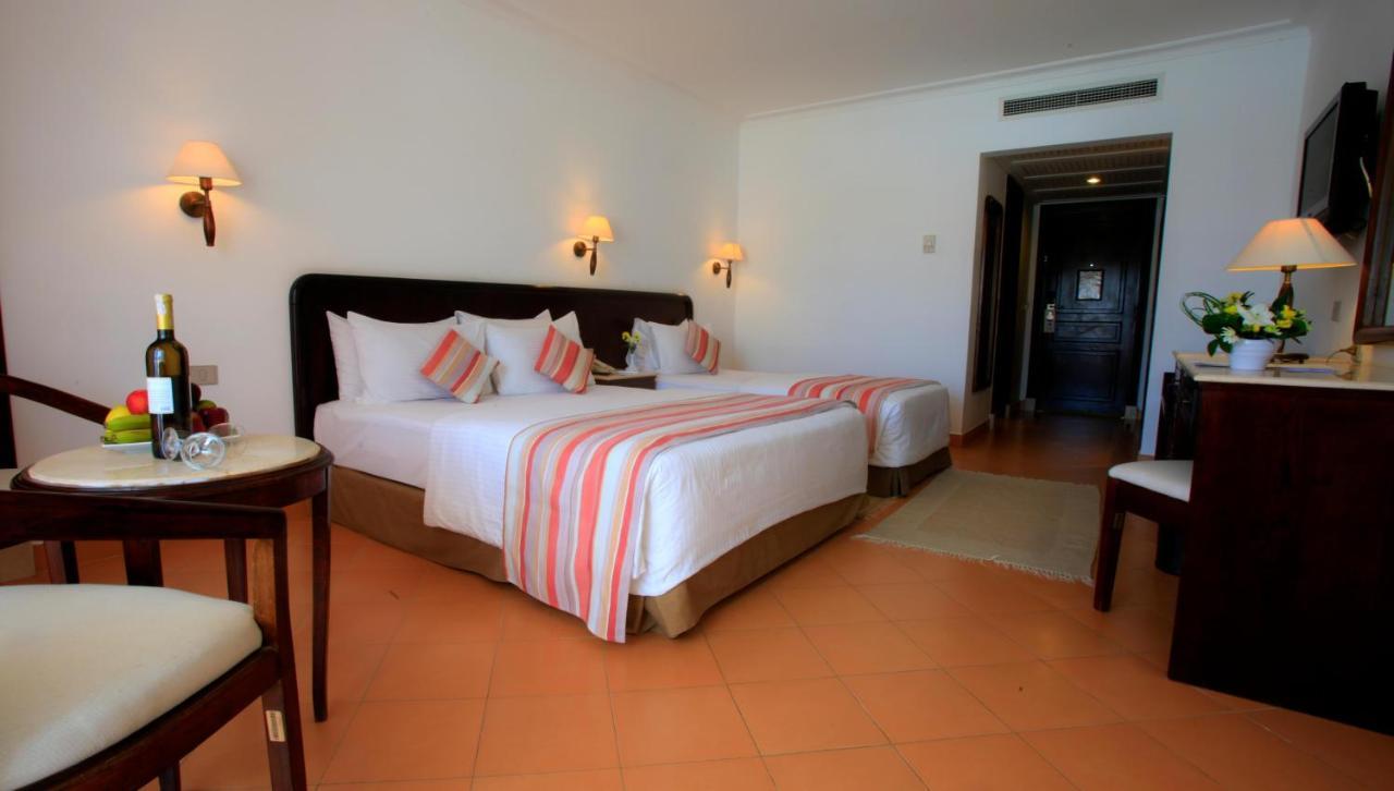 Deluxe Familienzimmer mit Queensize-Bett oder 2 Einzelbetten und Gartenblick