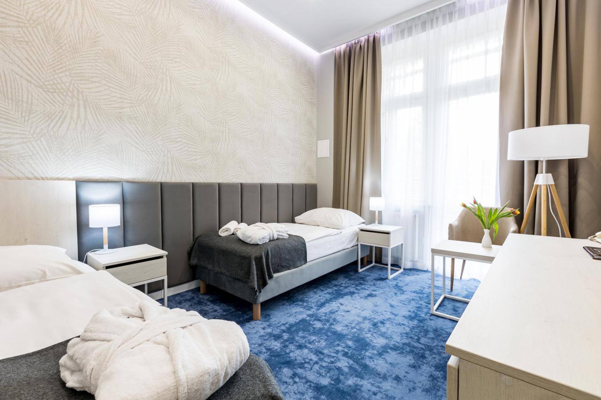 Doppel- oder Zweibettzimmer