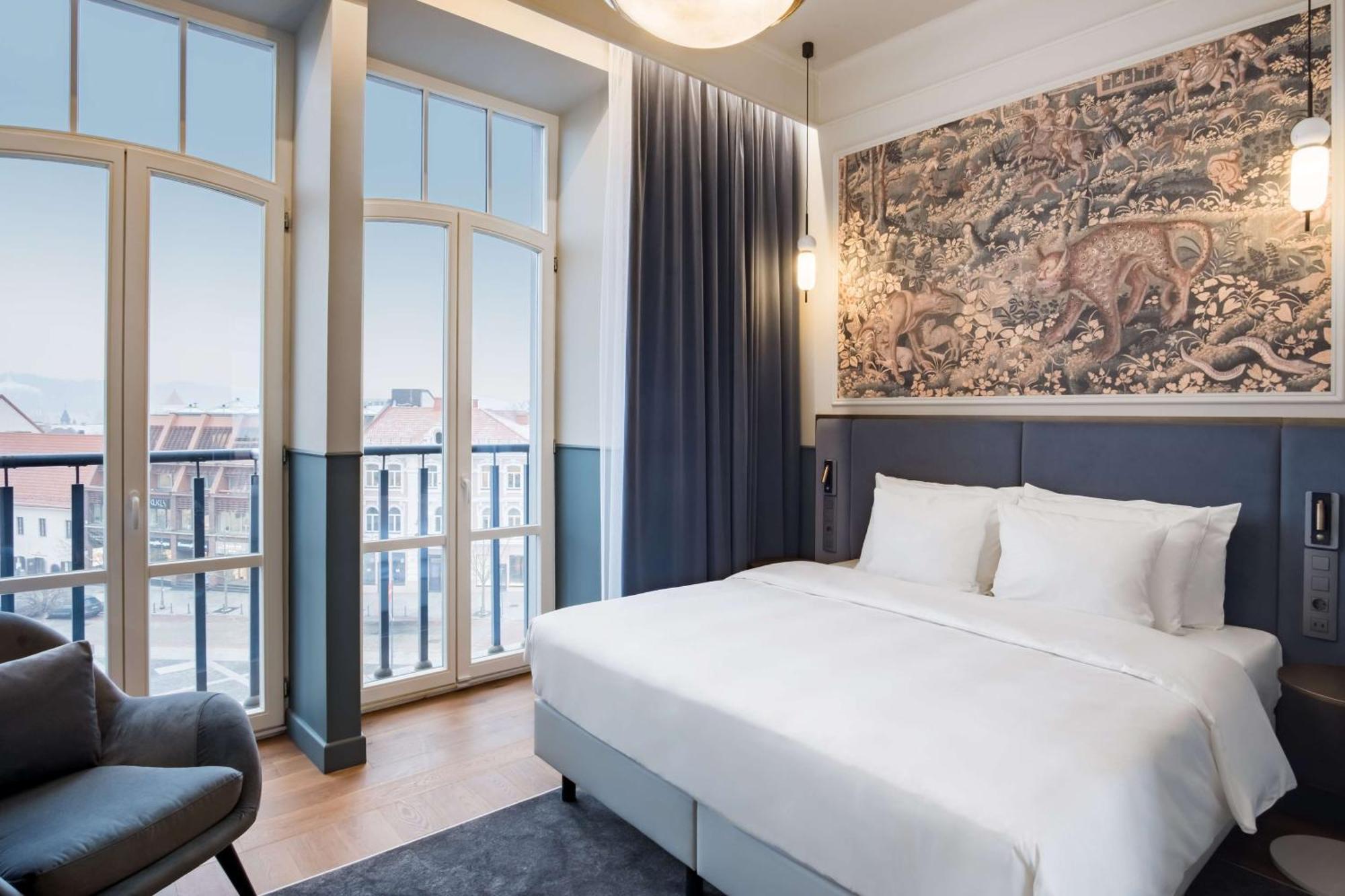 Zimmer Collection mit Balkon und Altstadtblick