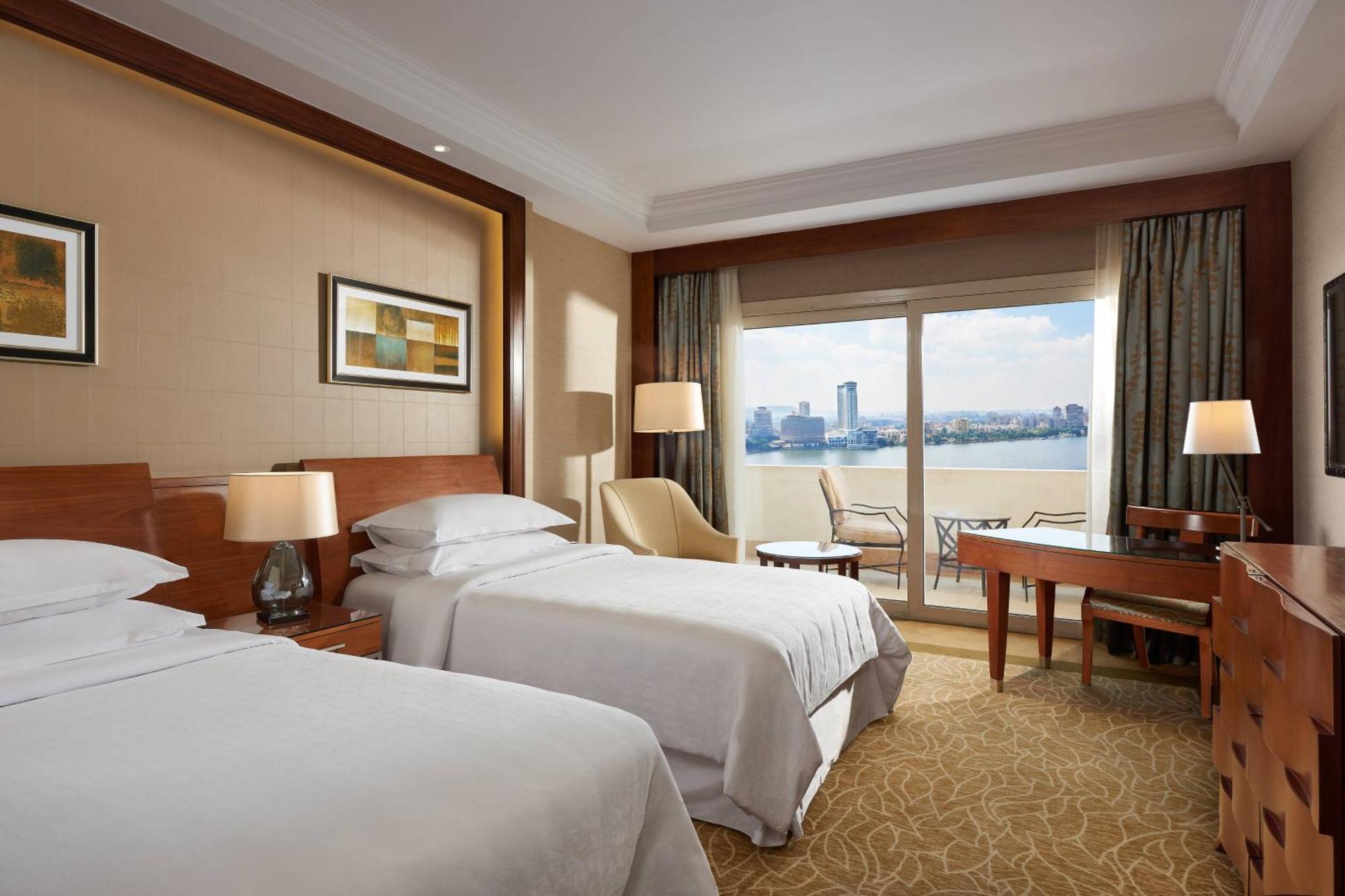 Premium Zweibettzimmer mit Balkon und seitlichem Flussblick