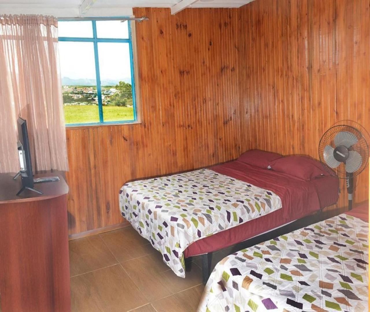 Zimmer mit Queensize-Bett