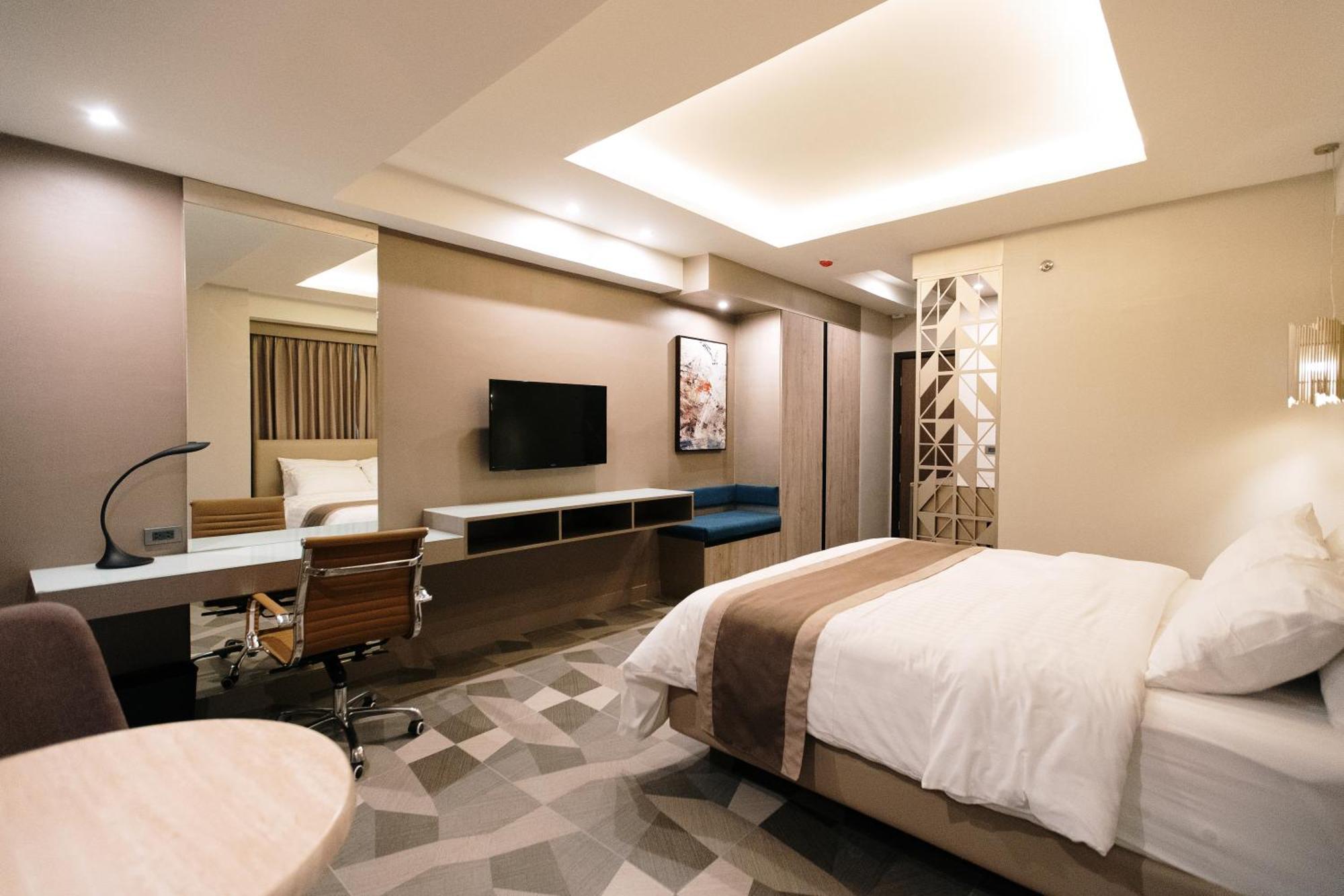 Deluxe Zimmer mit Kingsize-Bett
