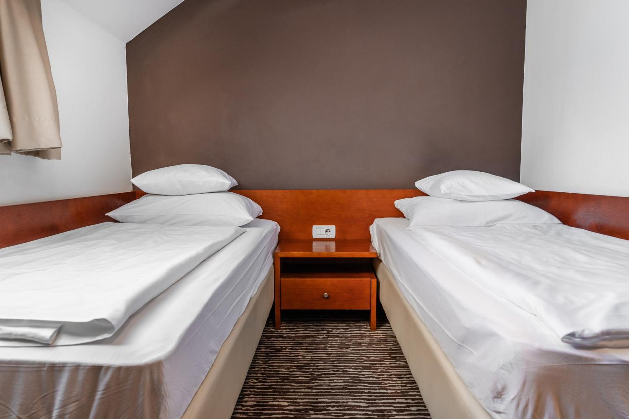 Doppel- oder Zweibettzimmer im Dachgeschoss