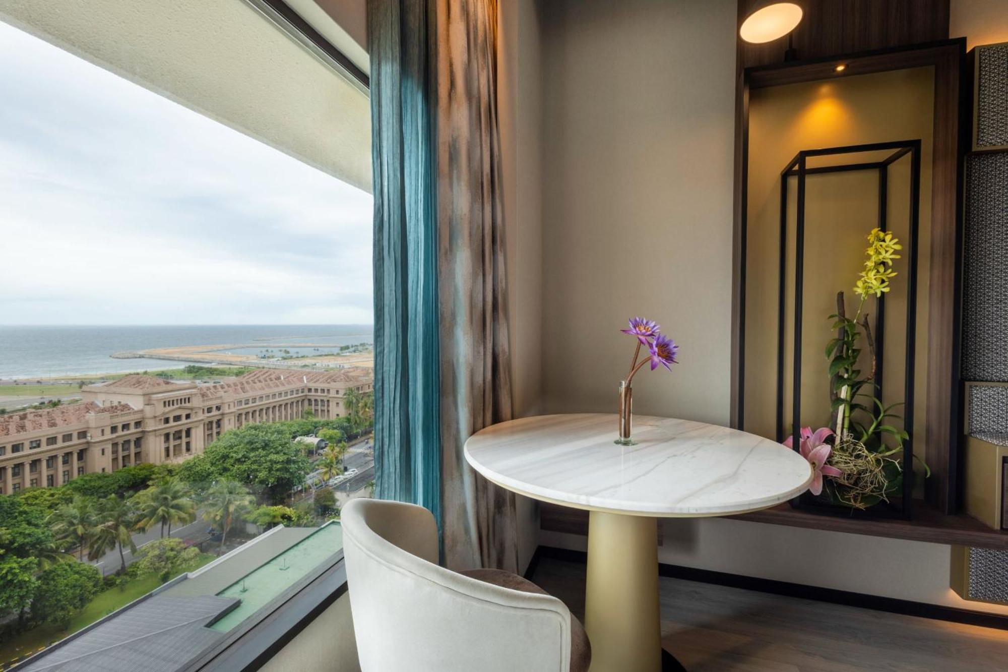 Deluxe Zimmer mit Kingsize-Bett mit Meerblick