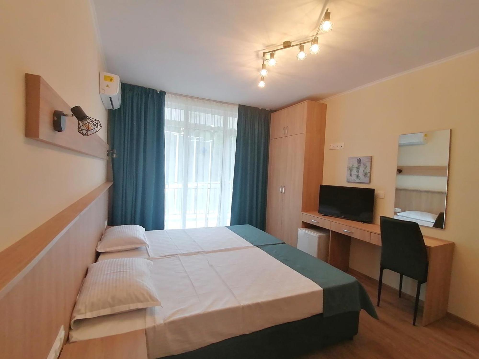 Doppel- oder Zweibettzimmer