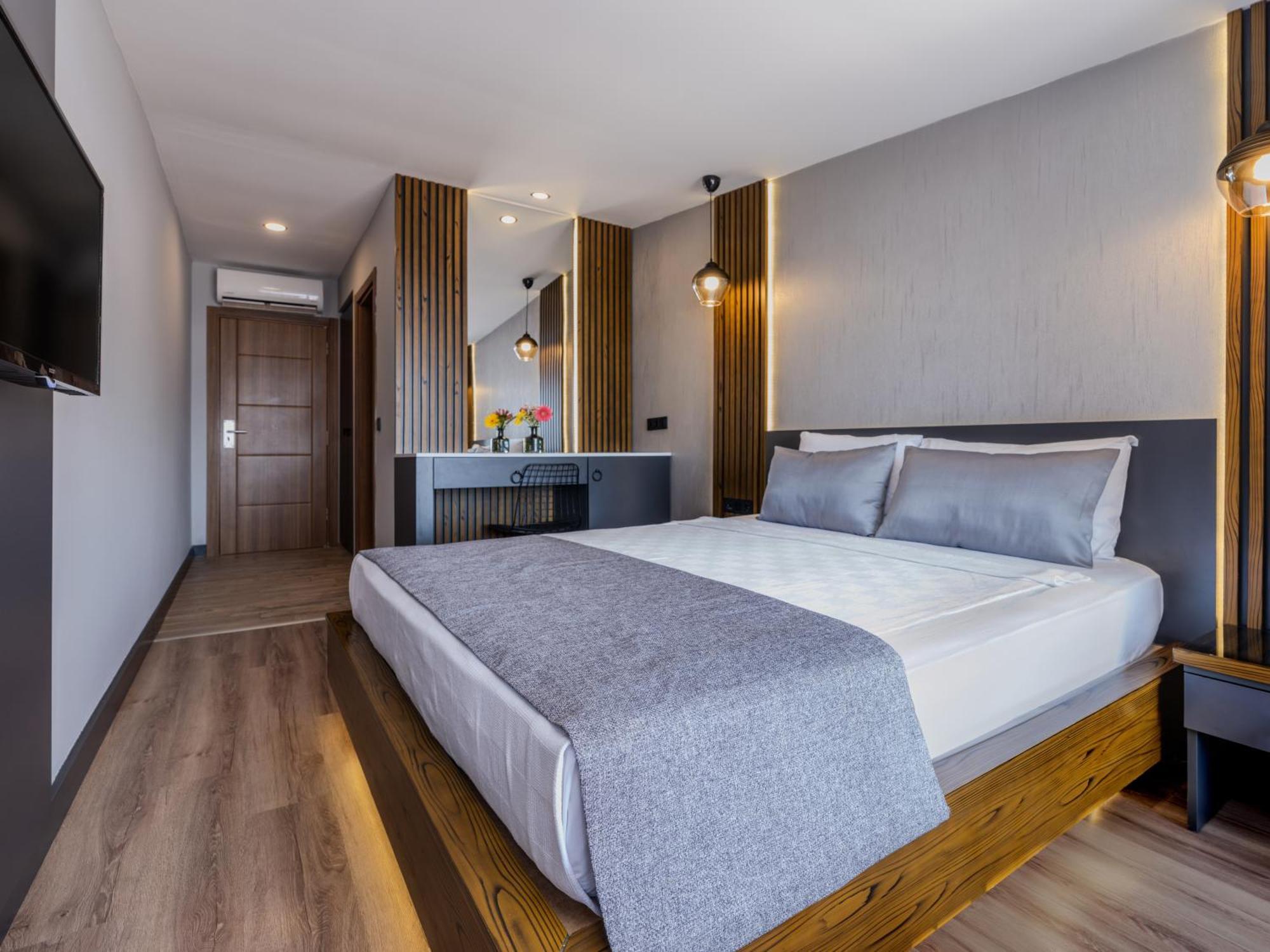 Doppel-/Zweibettzimmer mit seitlichem Meerblick