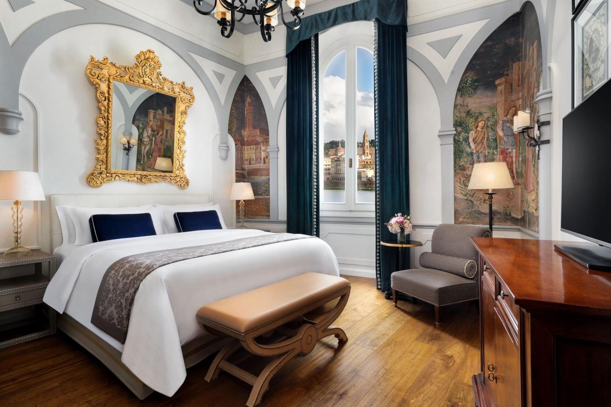 Deluxe Suite mit Kingsize-Bett und Blick auf den Fluss