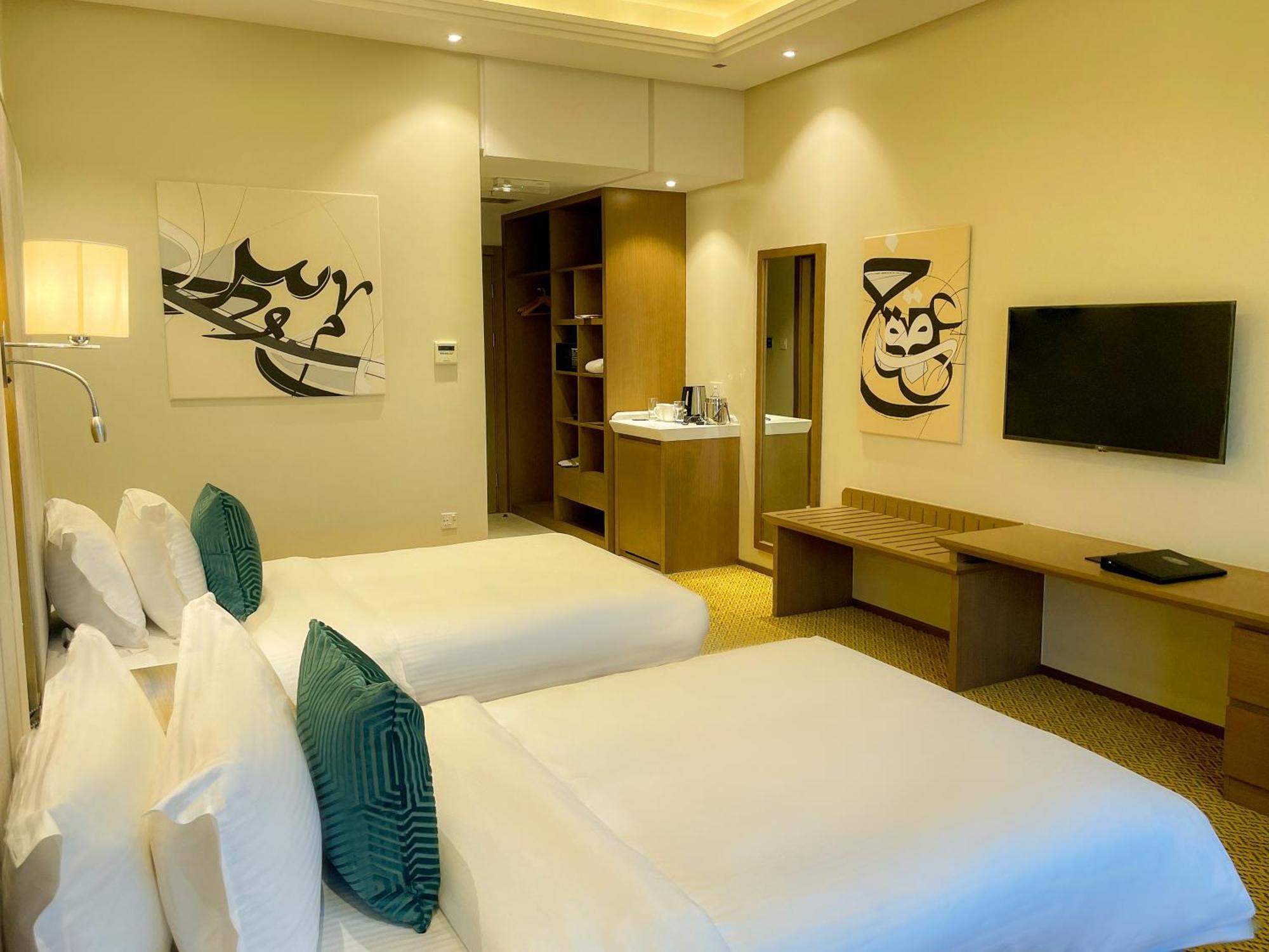 Deluxe Twin Room with Sea and city view