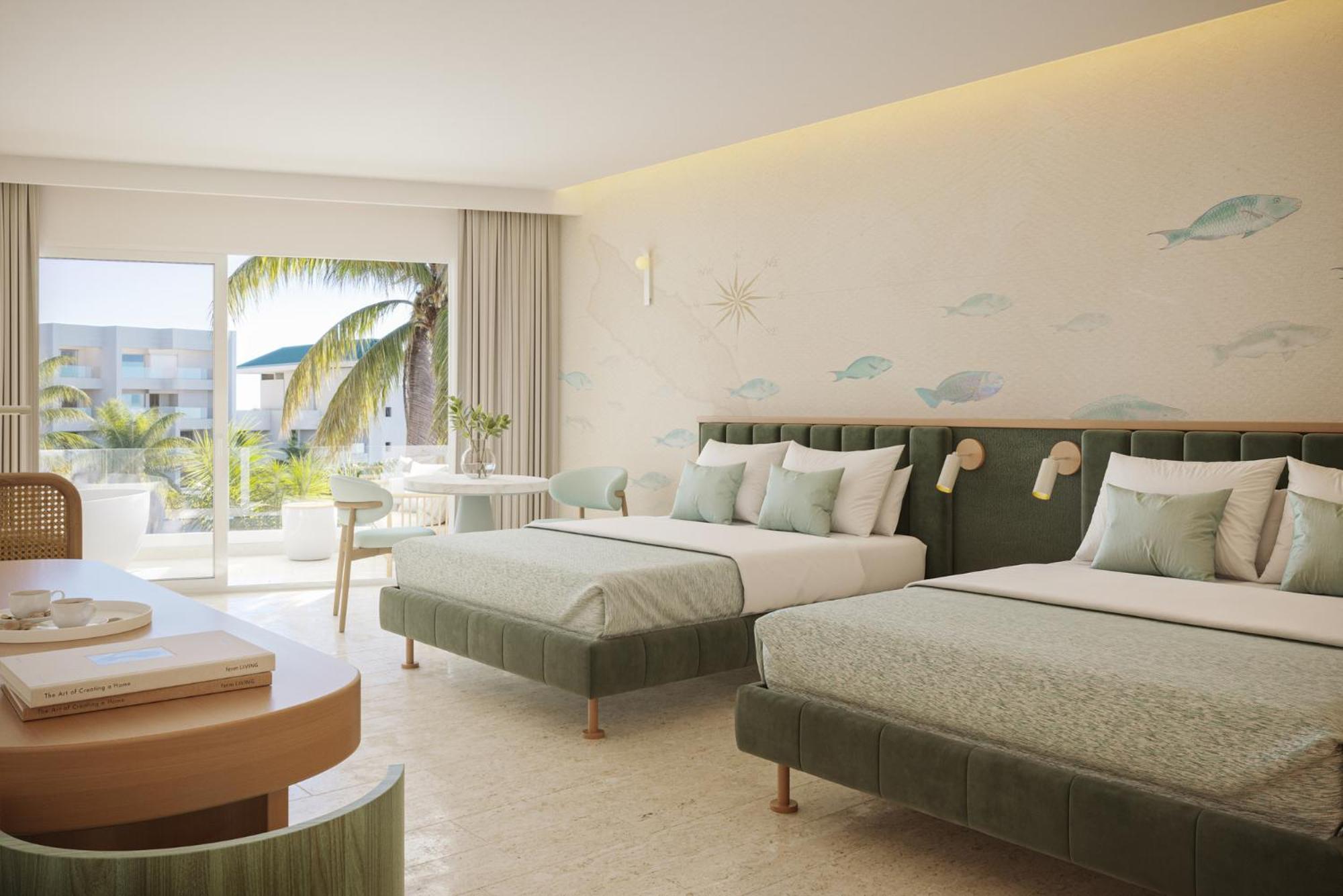 Suite mit 2 Queensize-Betten und Poolblick