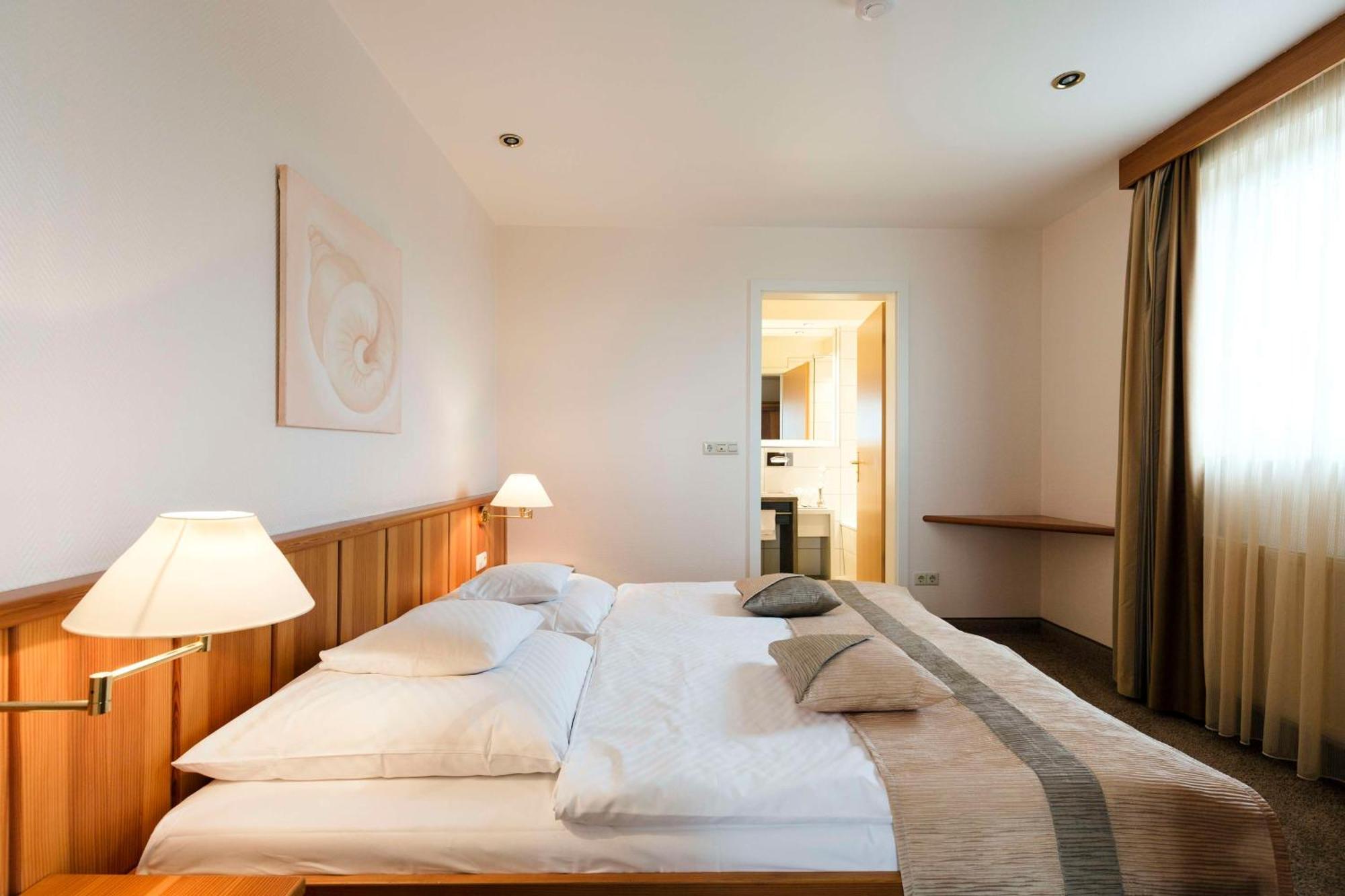 Junior Suite mit einem Doppelbett, Schlafsofa und Balkon