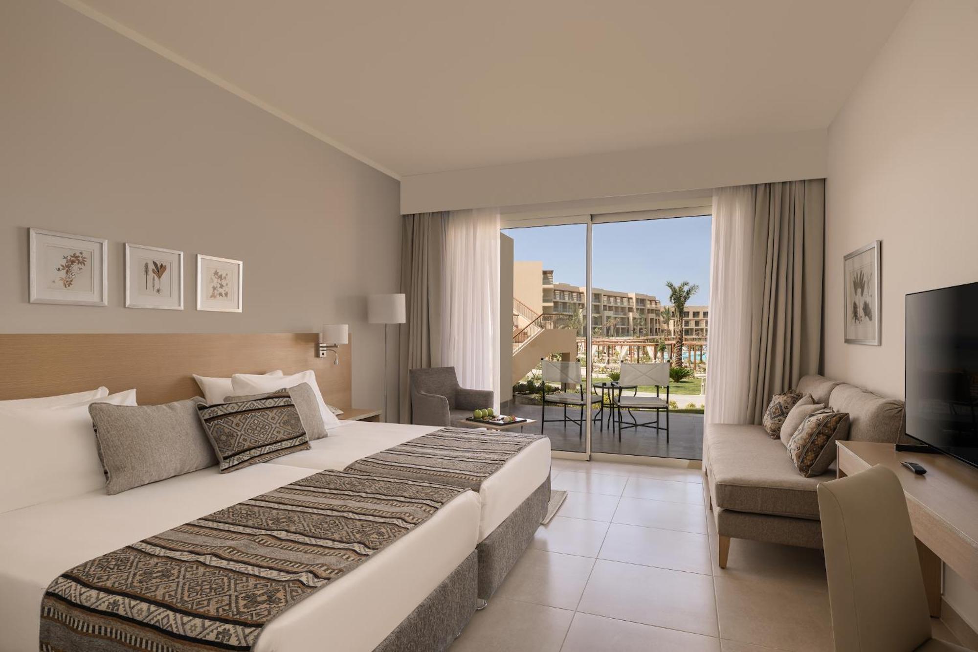 Deluxe Familienzimmer mit Queensize-Bett oder 2 Einzelbetten und Gartenblick