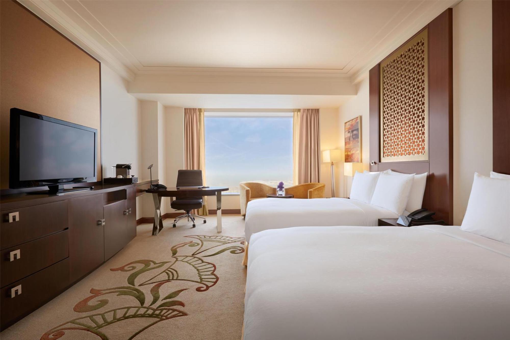 Deluxe Doppelzimmer mit 2 Doppelbetten und Meerblick
