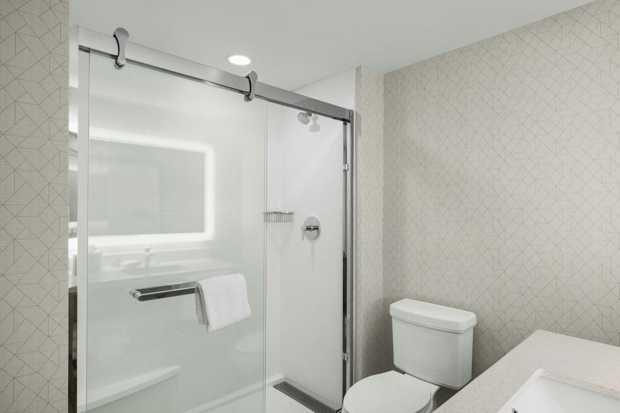 One-Bedroom King Suite Sofa Bed Bath Tub Mobility Hearing Accessible