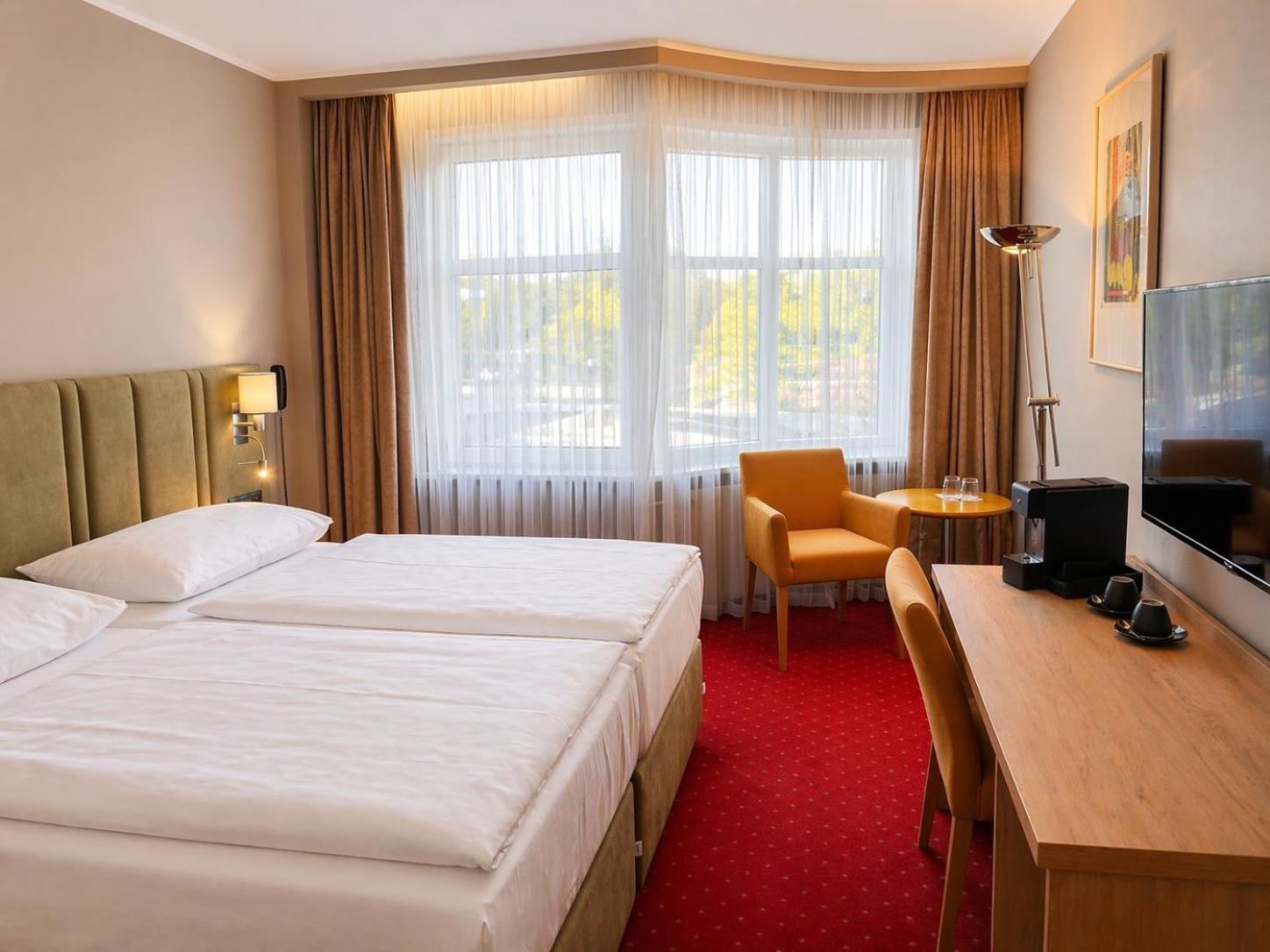 Deluxe Zimmer mit Kingsize-Bett
