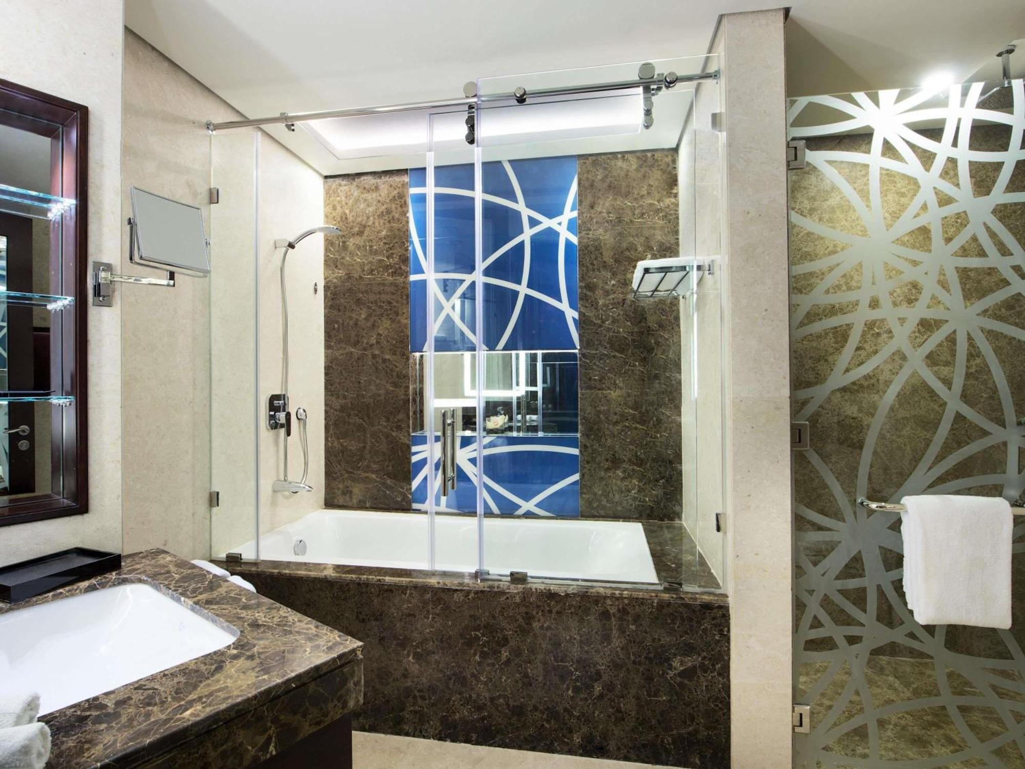Deluxe king bed room - Guaranteed Upgrade, Early Check-in at 11 AM, Late Check-out till 03 PM, 15% Discount on Food & beverage
