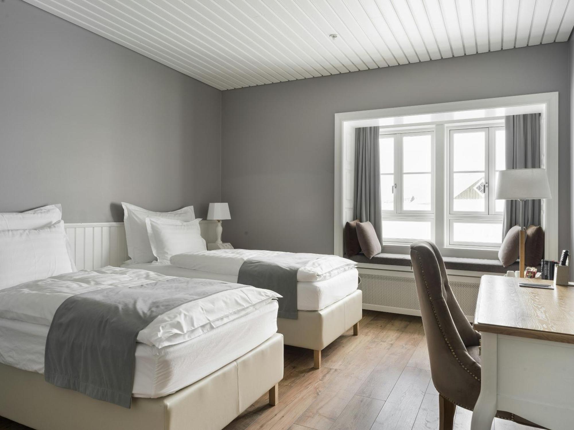 Doppel- oder Zweibettzimmer