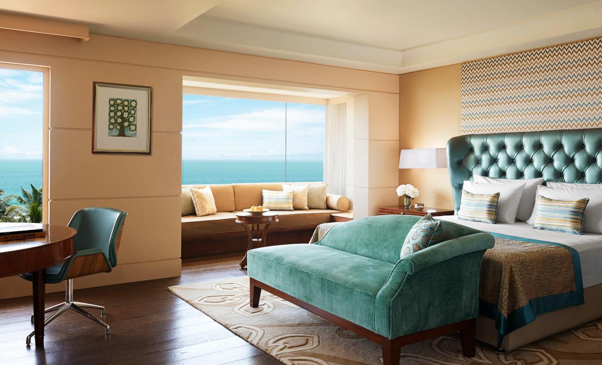 Zimmer Taj Club mit Kingsize-Bett und Meerblick