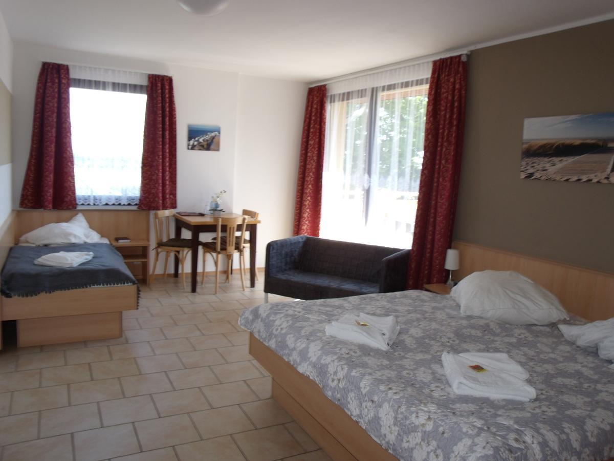 Dreibettzimmer mit Balkon