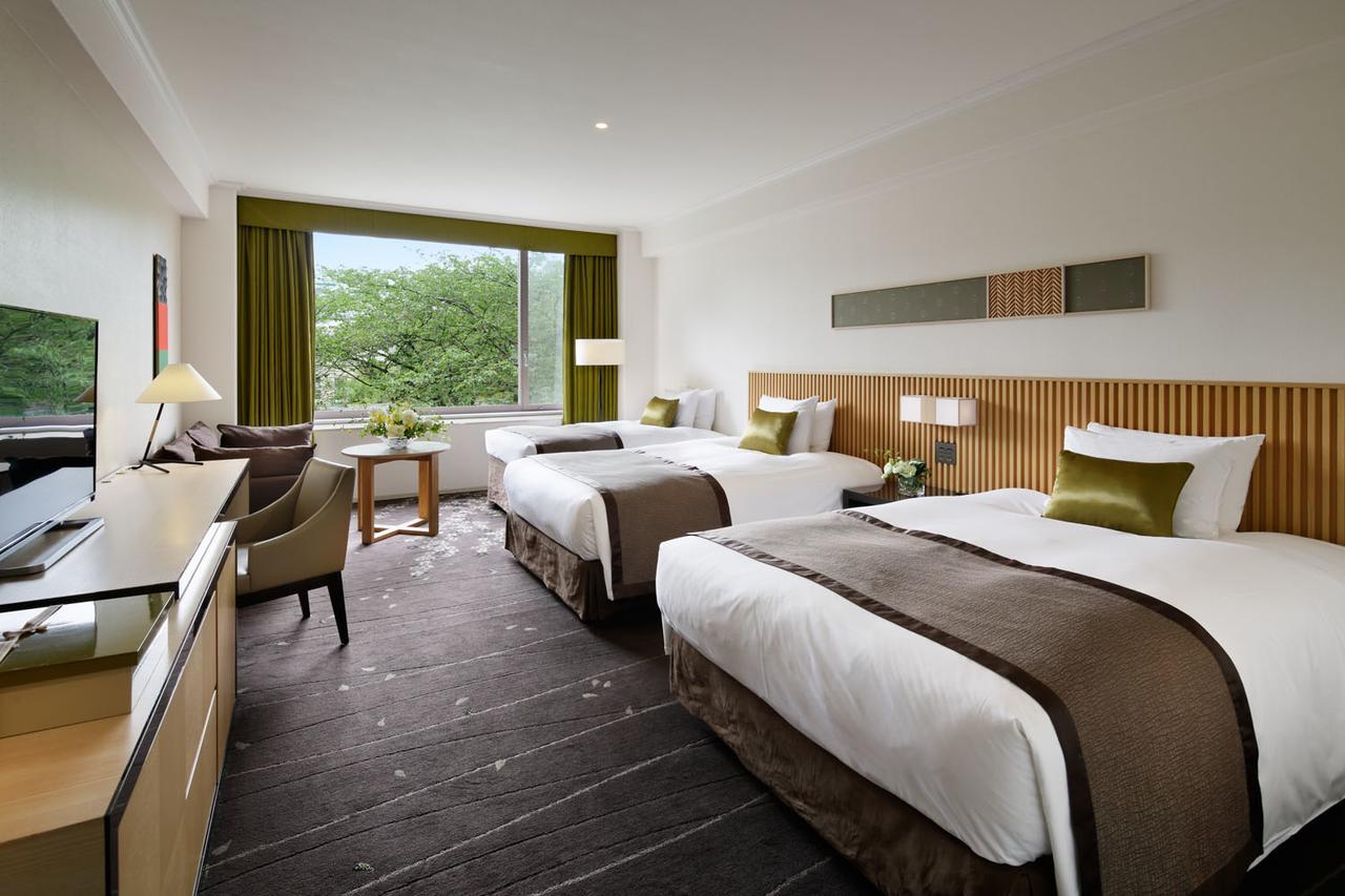 Deluxe Zweibettzimmer mit Zustellbett und Zugang zur Sauna - Nichtraucher