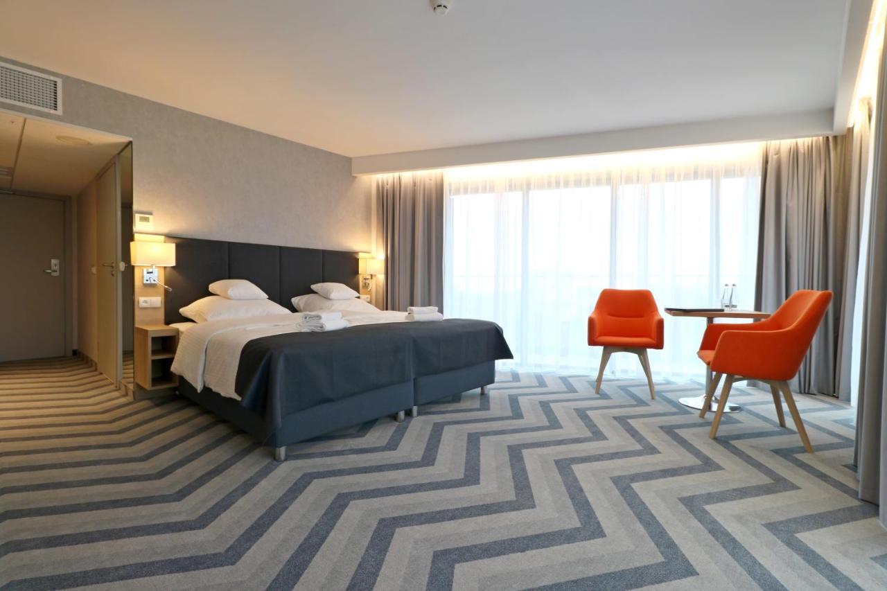 Deluxe Doppel-/Zweibettzimmer mit Balkon