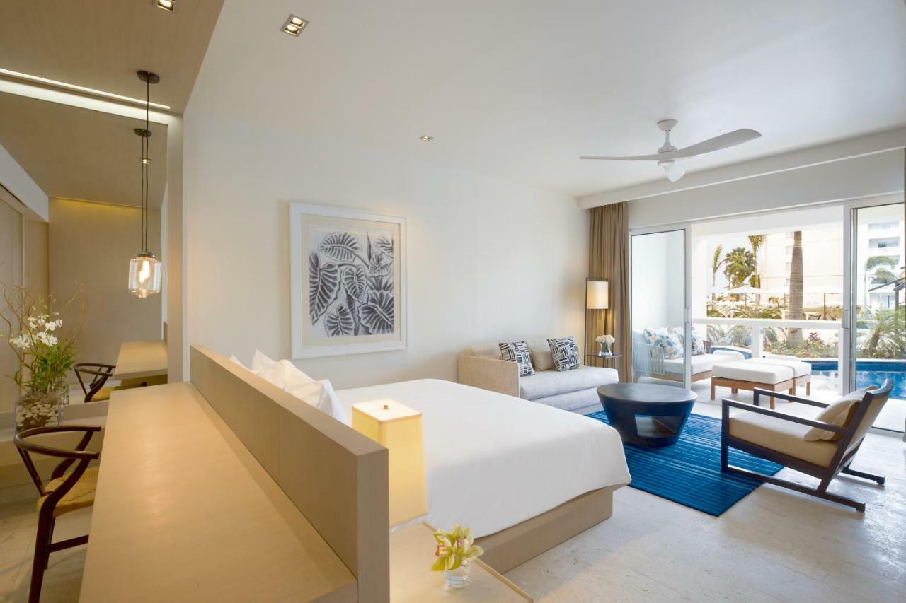 Junior Suite mit Kingsize-Bett und direktem Poolzugang