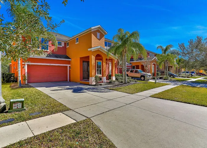 Colorful Home With Pool, Patio, Kitchen, Washer/Dryer, & Game Room Kissimmee