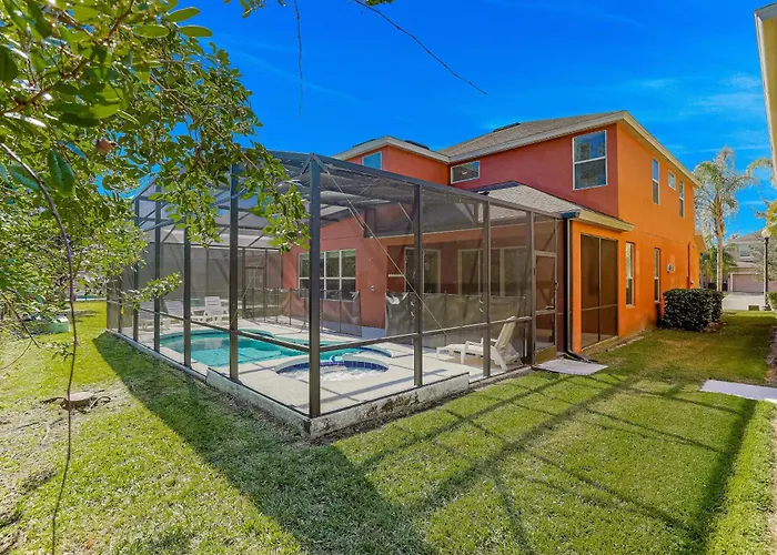 Colorful Home With Pool, Patio, Kitchen, Washer/Dryer, & Game Room Kissimmee